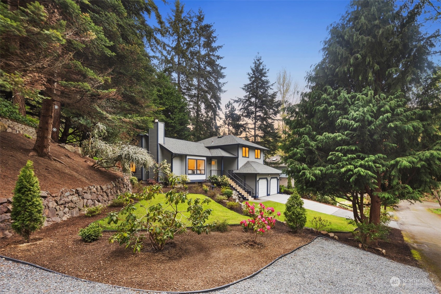 21109 Shell Valley Road Edmonds, WA 98026 - Photo 36 of 40 a front view of a house with a yard
