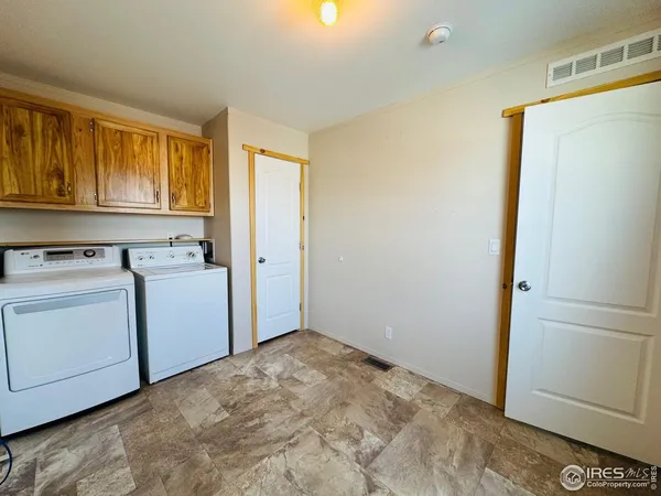 a view of utility room with washer and dryer
