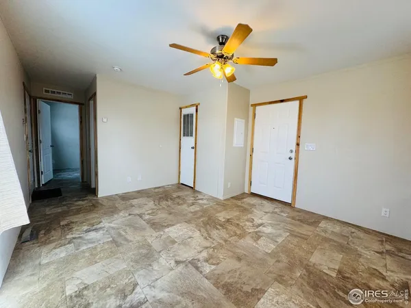 a view of a bedroom with a natural light
