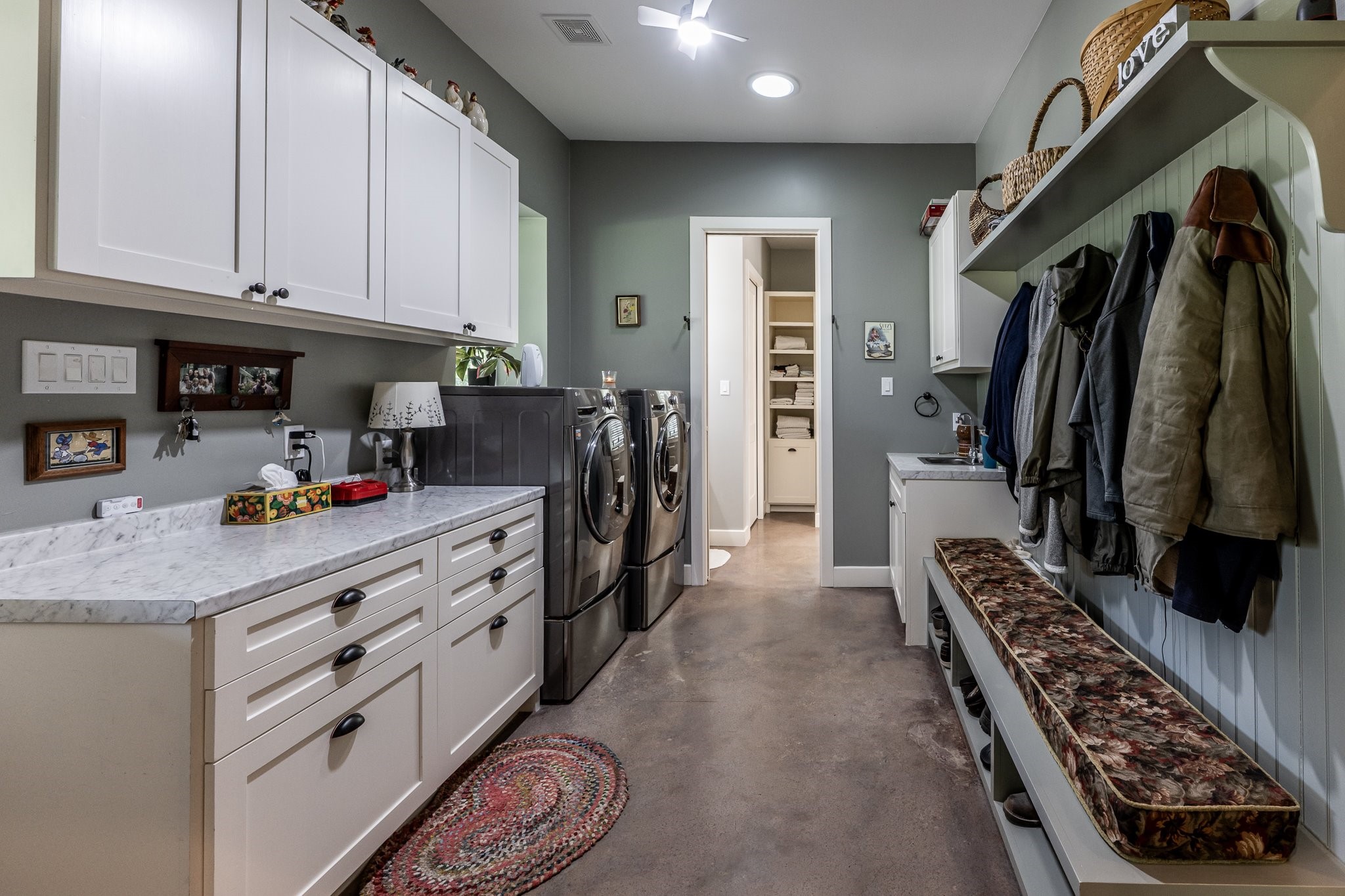 13334 Fultz Road Conroe, TX 77304 - Photo 23 of 49 This well-appointed mud and utility room combines everyday ease with custom storage—and includes access to a generous 14x11 storage room for all your extras.