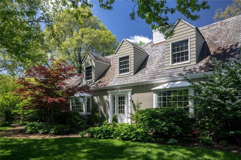 Situated on lovely professonally manicured grounds with perennial gardens and flowering trees ...