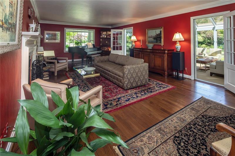 Formal living room with hardwood floors ...crown molding ...