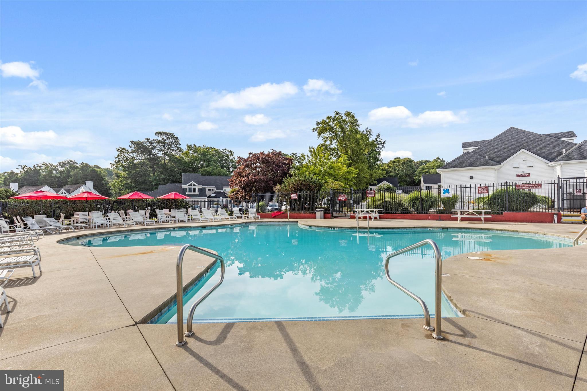 Lot #180 River Run Lane Berlin, MD 21811 - Photo 17 of 40 a view of swimming pool with outdoor seating and city view
