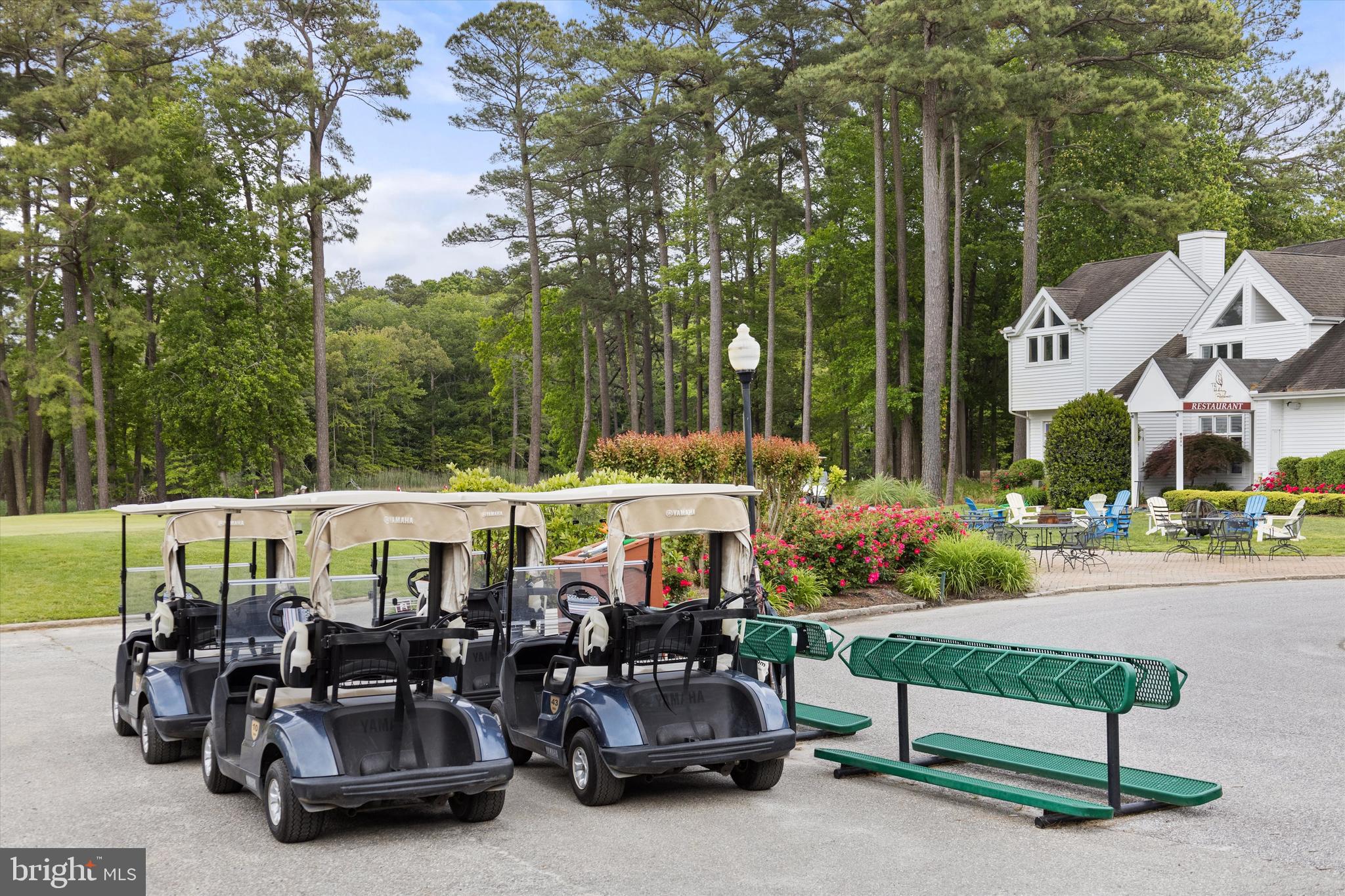 Lot #180 River Run Lane Berlin, MD 21811 - Photo 36 of 40 a front view of a house with garden and sitting area
