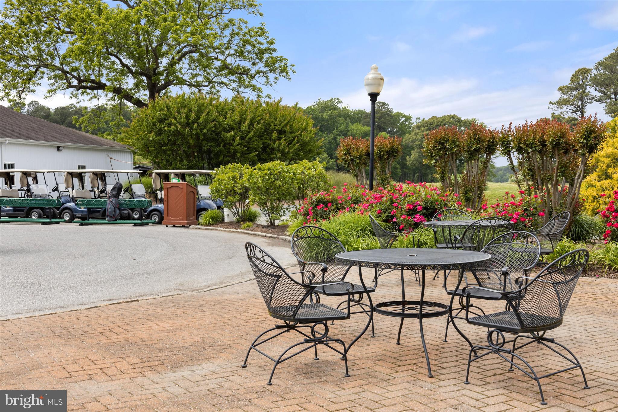 Lot #180 River Run Lane Berlin, MD 21811 - Photo 37 of 40 a view of a chairs and table in a backyard