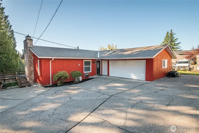 a view of a house with a garage and a garage