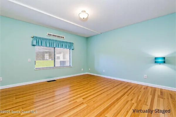 a kitchen with stainless steel appliances granite countertop a stove microwave refrigerator and sink
