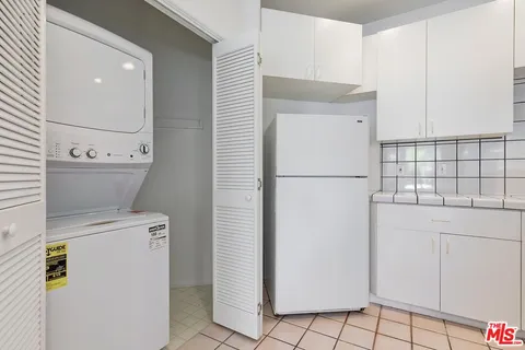 a bathroom with a sink and vanity