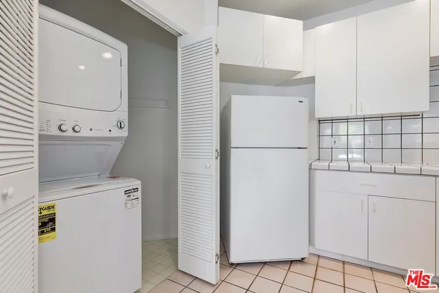 a bathroom with a sink and vanity