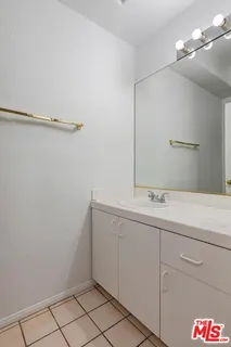 a view of an empty room with windows