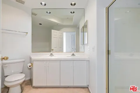 a white bath tub sitting in a bathroom