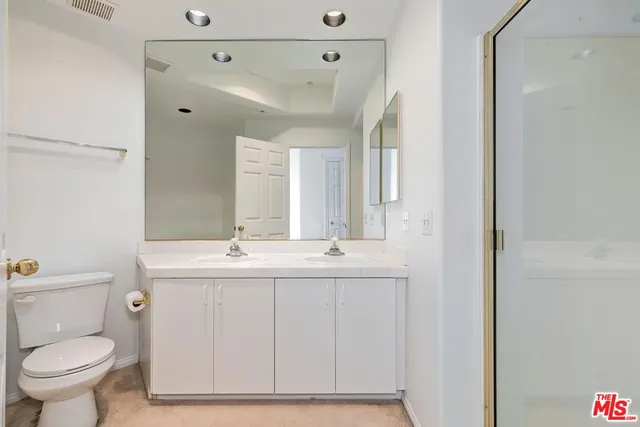 a white bath tub sitting in a bathroom
