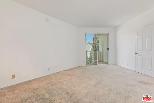 an empty room with an entryway