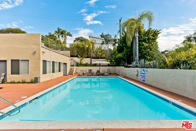 a view of a house with a swimming pool