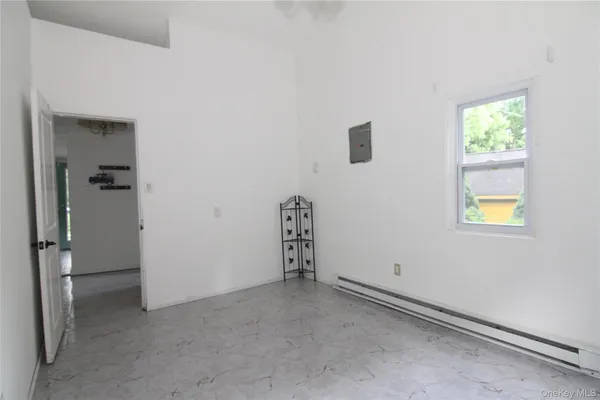 a view of a room with a sink and closet
