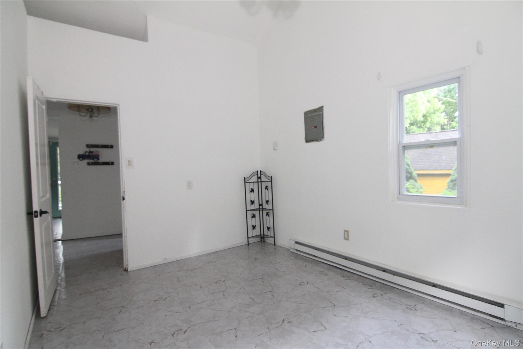 71 Miller Road, Unit 13 Hopewell Junction, NY 12533 - Photo 15 of 28 an empty room with windows and closet