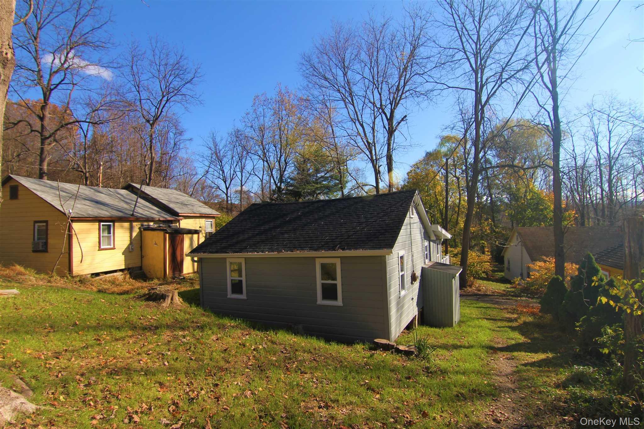71 Miller Road, Unit 13 Hopewell Junction, NY 12533 - Photo 25 of 28 a view of a house with a yard