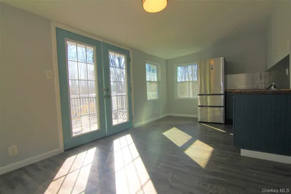 an empty room with windows