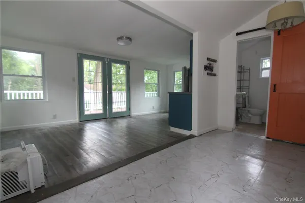 a kitchen with granite countertop a stove and a refrigerator