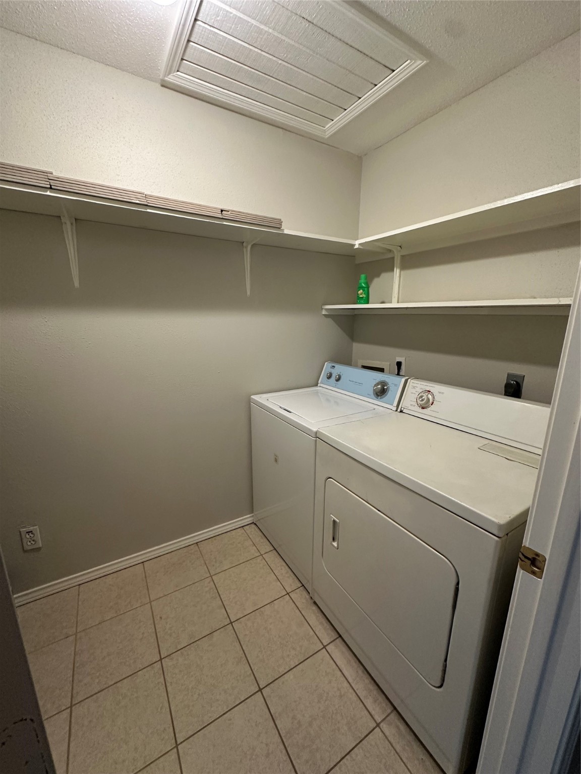 6500 Sands Point Drive, Unit 404 Houston, TX 77074 - Photo 15 of 27 a utility room with dryer and washer
