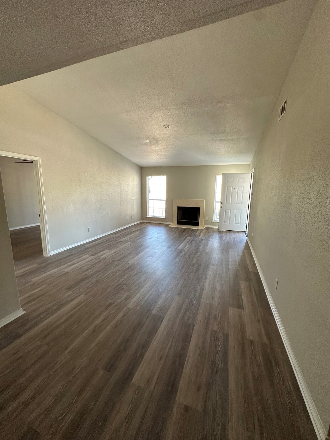 6500 Sands Point Drive, Unit 404 Houston, TX 77074 - Photo 18 of 27 a view of an empty room with wooden floor and a window