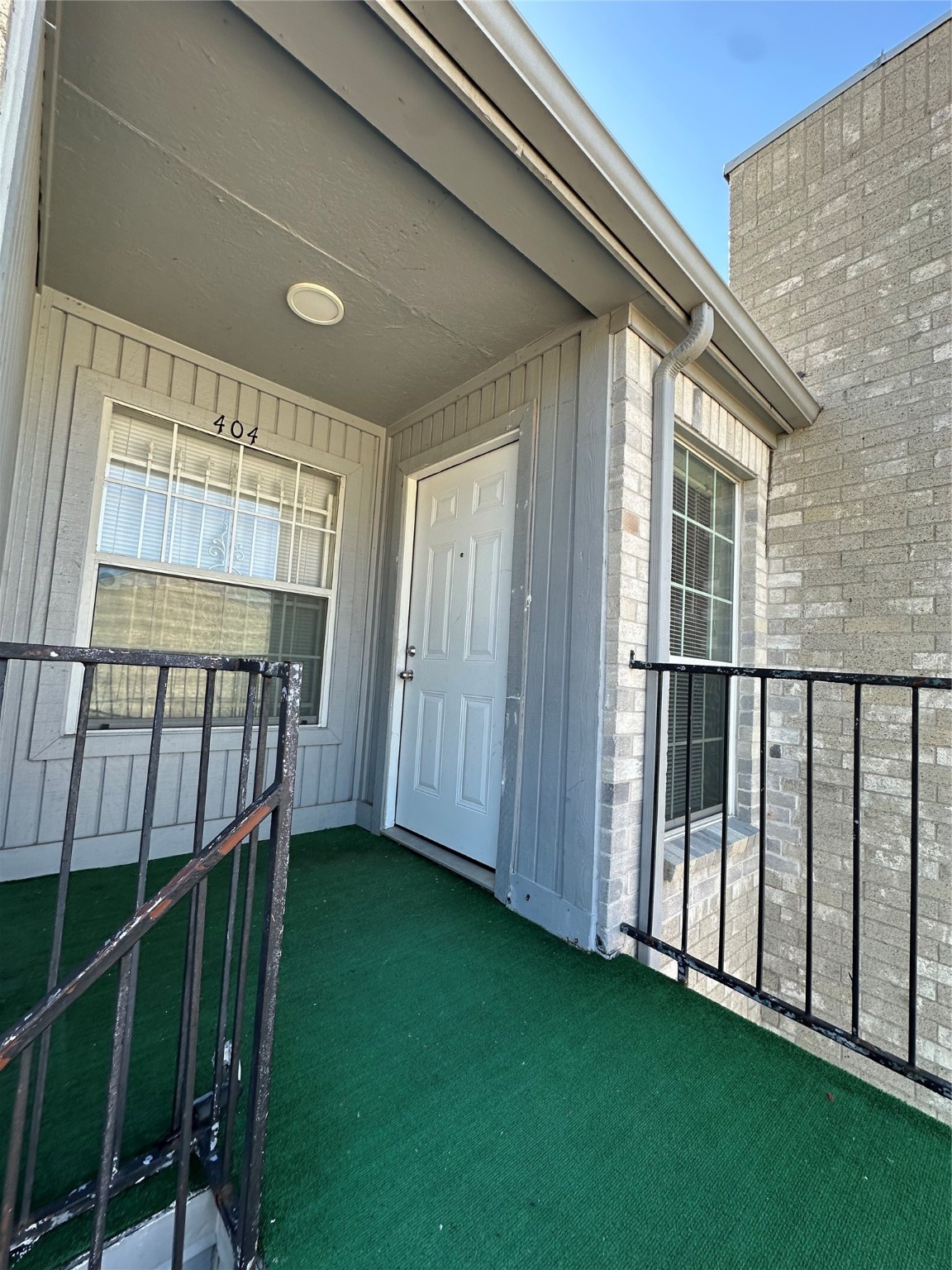 6500 Sands Point Drive, Unit 404 Houston, TX 77074 - Photo 2 of 27 a view of an entryway with a garden