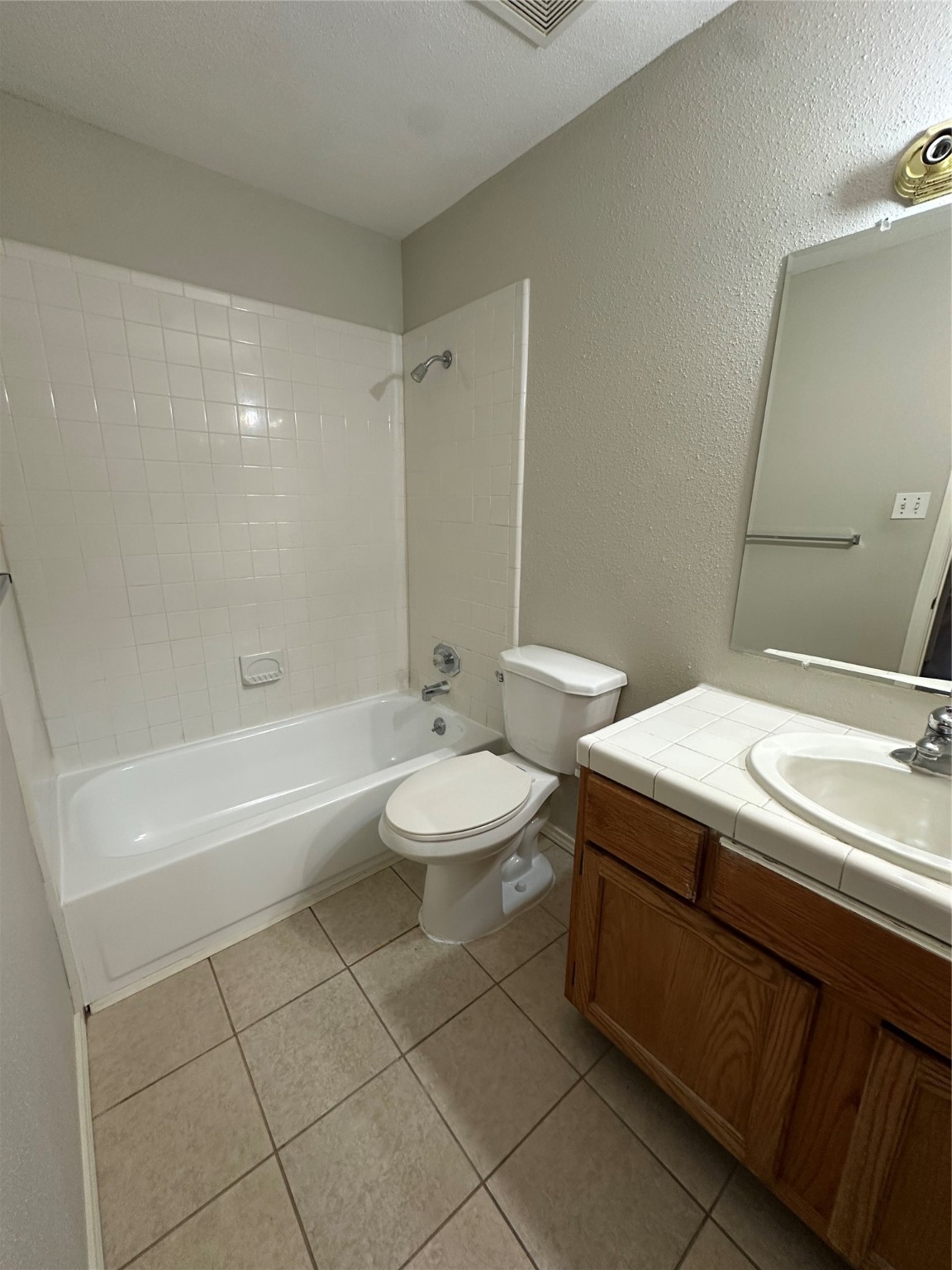 6500 Sands Point Drive, Unit 404 Houston, TX 77074 - Photo 26 of 27 a bathroom with a sink a toilet and a bathtub