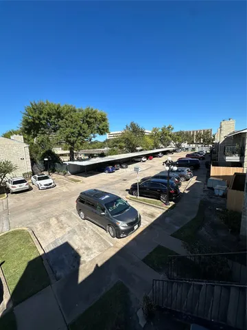 a view of a backyard of the house