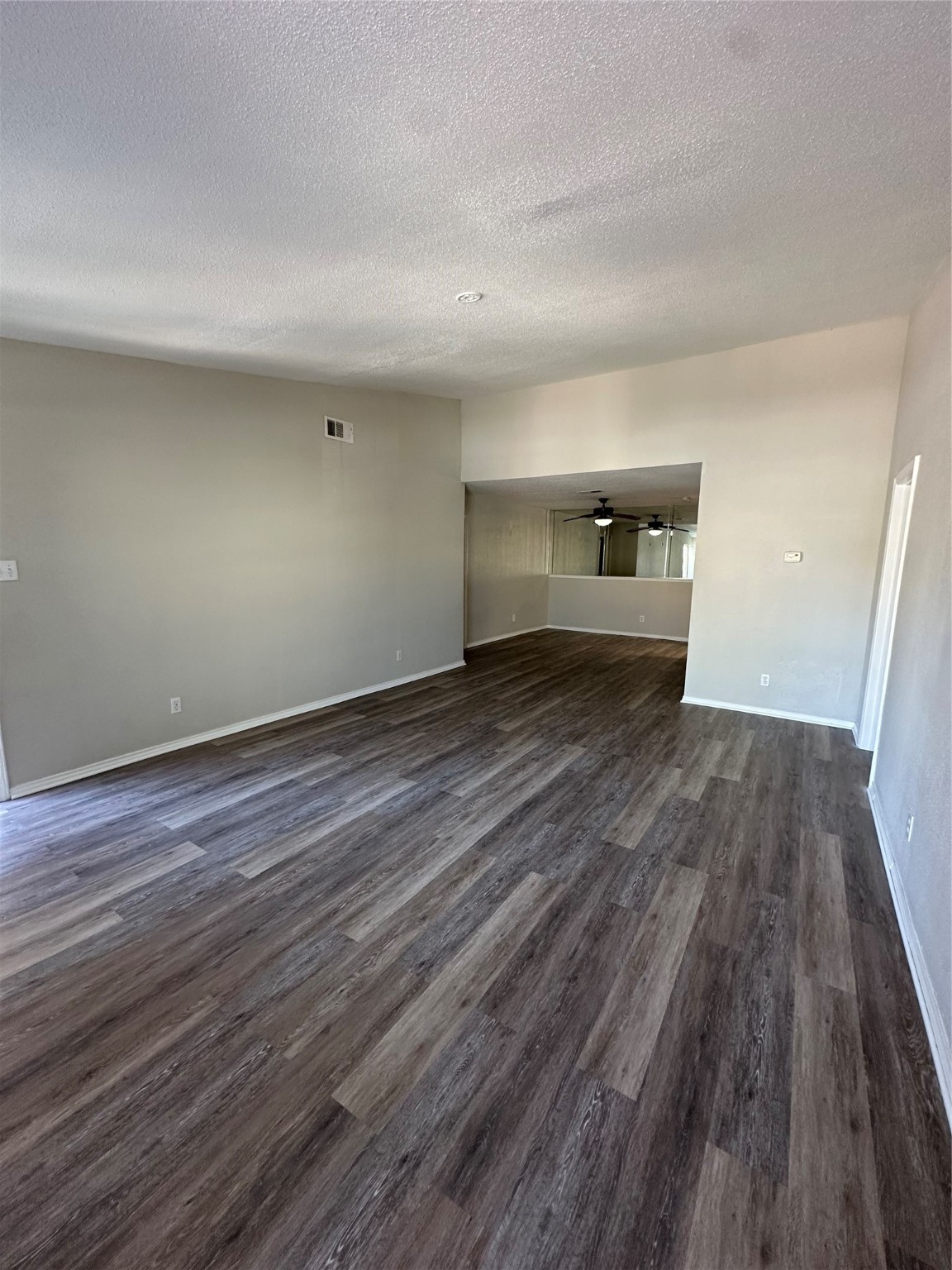 6500 Sands Point Drive, Unit 404 Houston, TX 77074 - Photo 5 of 27 a view of empty room with wooden floor