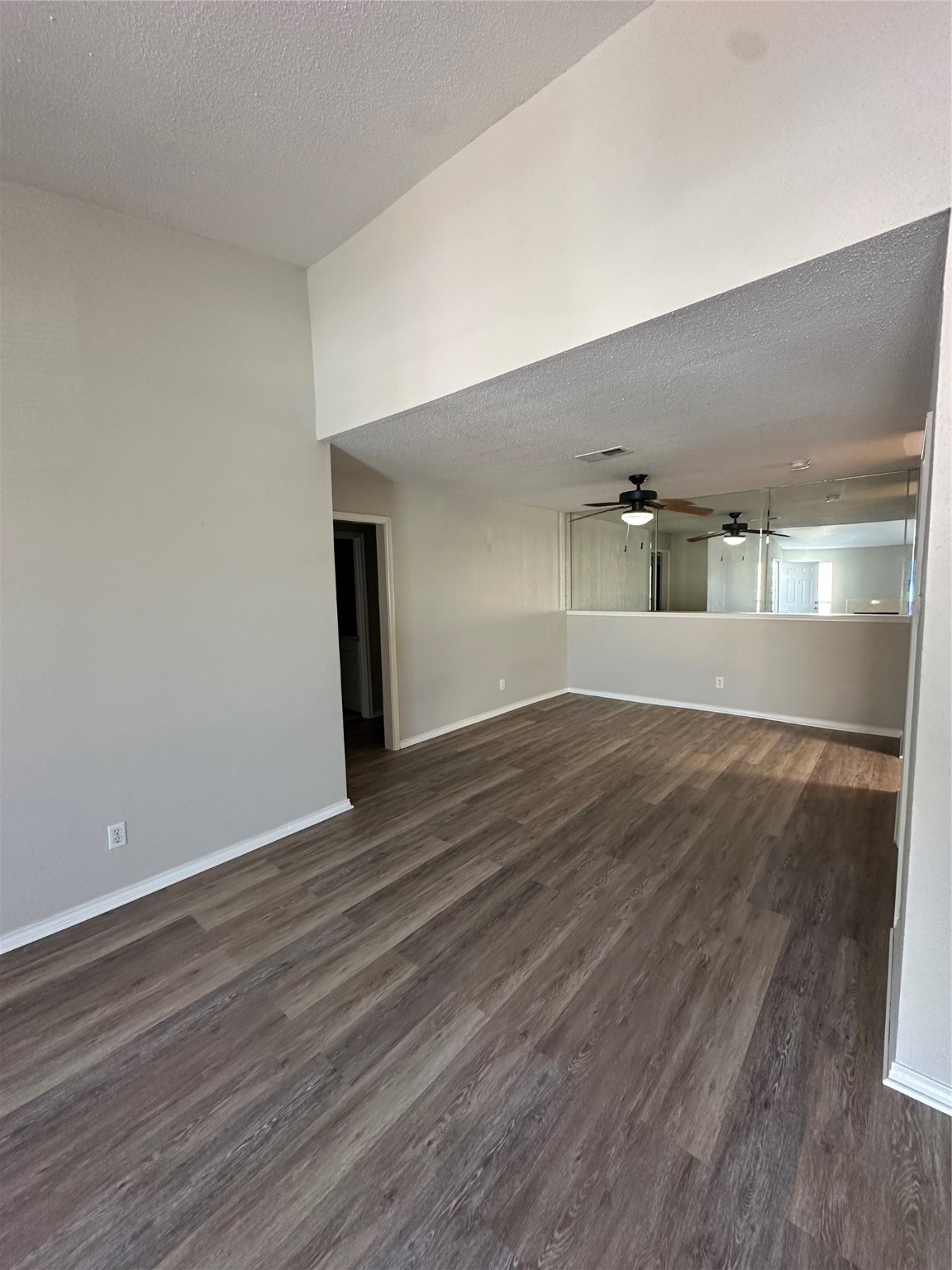6500 Sands Point Drive, Unit 404 Houston, TX 77074 - Photo 6 of 27 a view of empty room with wooden floor