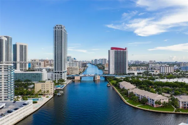 a view of a city with tall buildings
