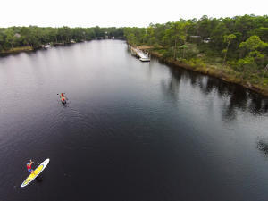 226 Suwannee Drive, Unit LOT 96 Watersound, FL 32461 - Photo 11 of 17 a view of a lake with a mountain