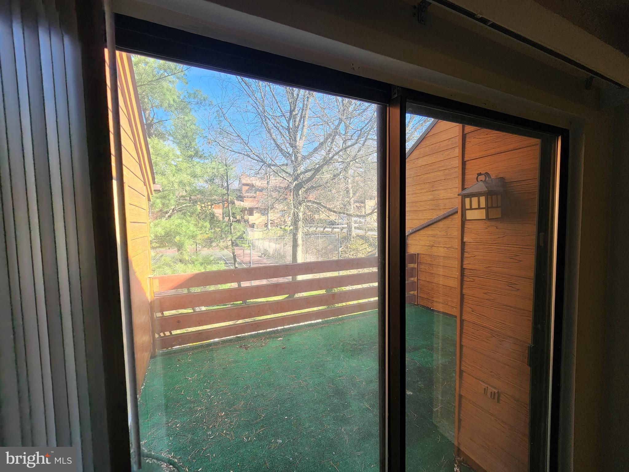 7603 Weather Worn Way, Unit F Columbia, MD 21046 - Photo 17 of 17 a view of a large window with an outdoor space