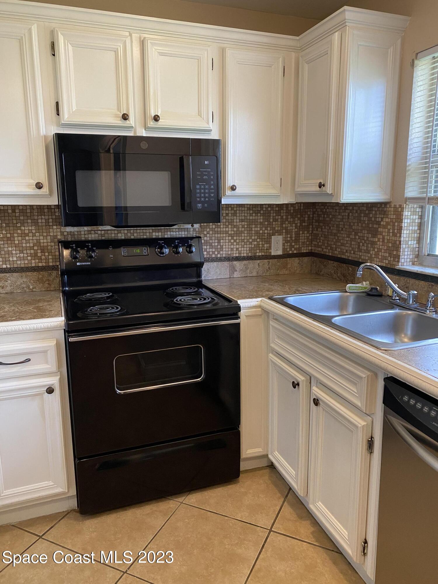 210 Spring Drive, Unit 7 Merritt Island, FL 32953 - Photo 2 of 14 IMG_7459