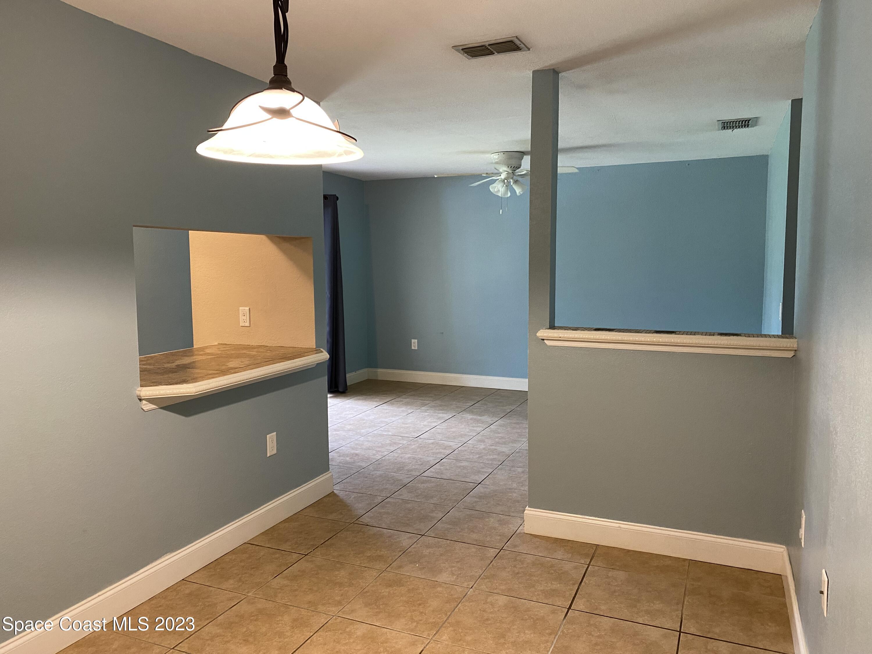 210 Spring Drive, Unit 7 Merritt Island, FL 32953 - Photo 5 of 14 IMG_7460