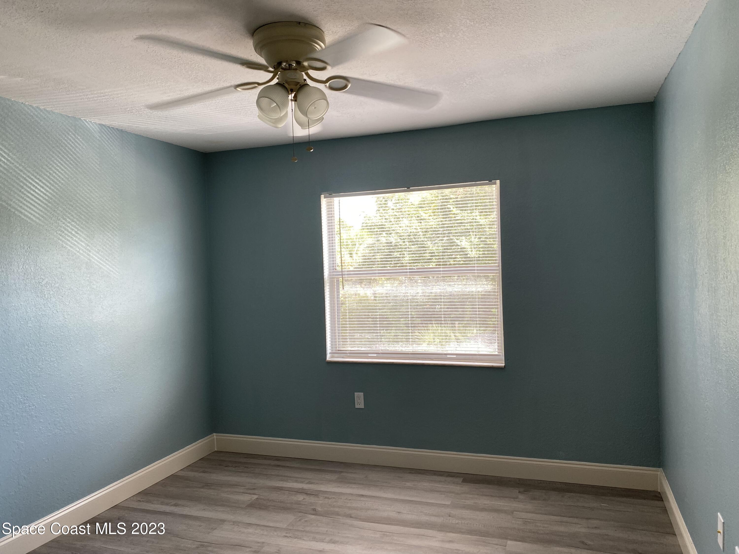 210 Spring Drive, Unit 7 Merritt Island, FL 32953 - Photo 7 of 14 IMG_7450