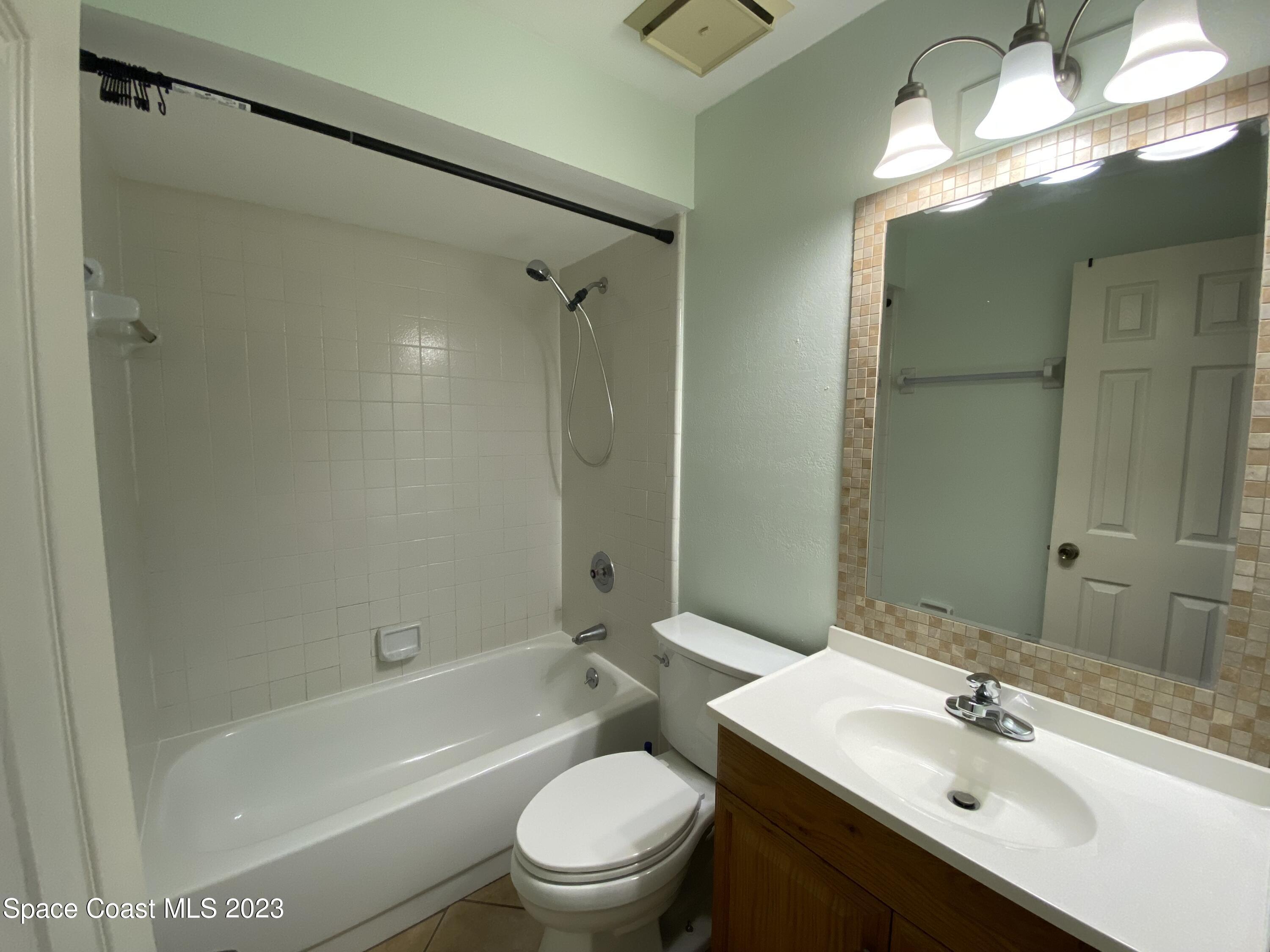 210 Spring Drive, Unit 7 Merritt Island, FL 32953 - Photo 10 of 14 IMG_7453