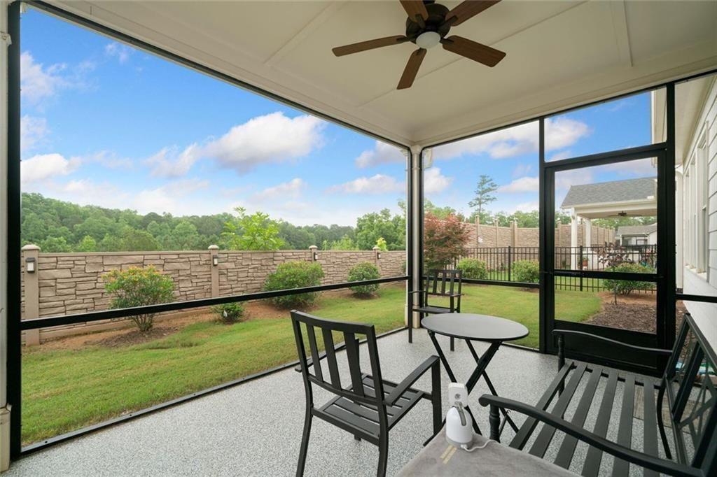 19 Grand Circle Jasper, GA 30143 - Photo 16 of 36 a view of a chairs and table in the balcony