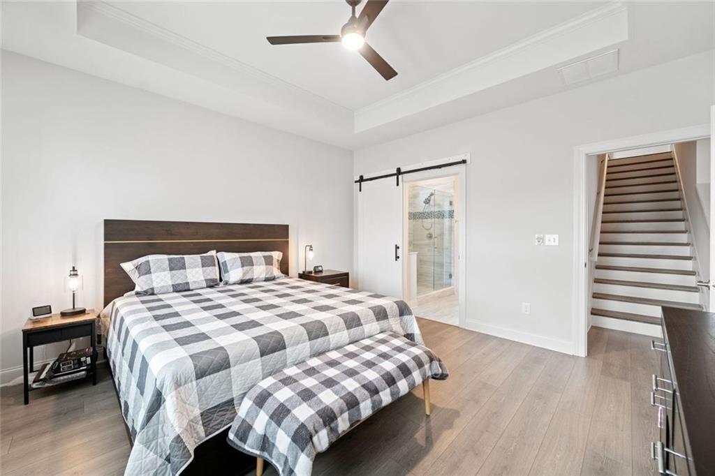 19 Grand Circle Jasper, GA 30143 - Photo 18 of 36 a bedroom with a bed and a window