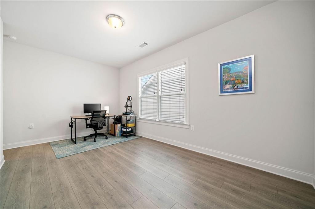 19 Grand Circle Jasper, GA 30143 - Photo 25 of 36 a view of a workspace with furniture and a window