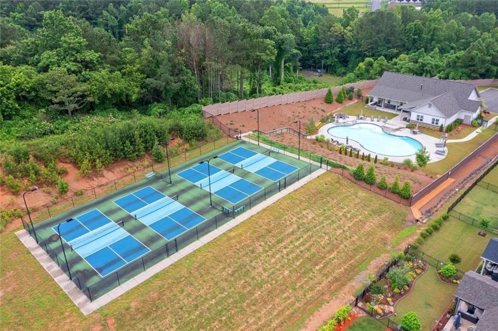 19 Grand Circle Jasper, GA 30143 - Photo 33 of 36 a view of a tennis ground with large trees