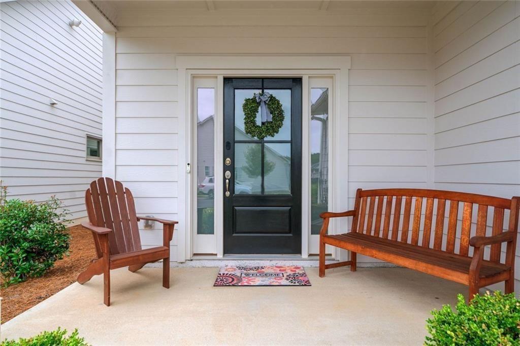 19 Grand Circle Jasper, GA 30143 - Photo 4 of 36 a view of a two chairs in the porch