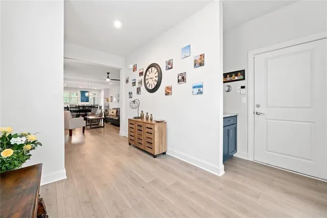 wooden floor with white walls