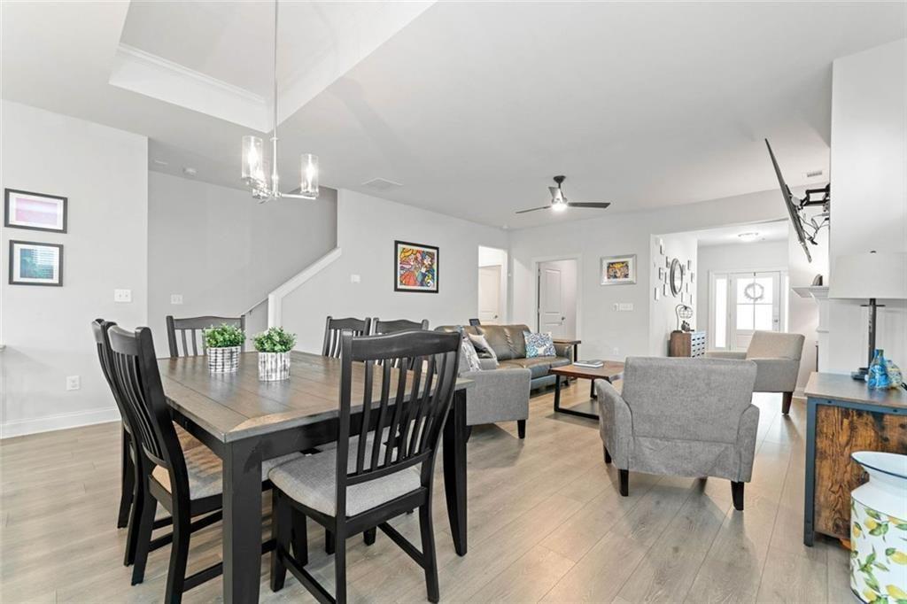 19 Grand Circle Jasper, GA 30143 - Photo 8 of 36 a view of a dining room with furniture and wooden floor