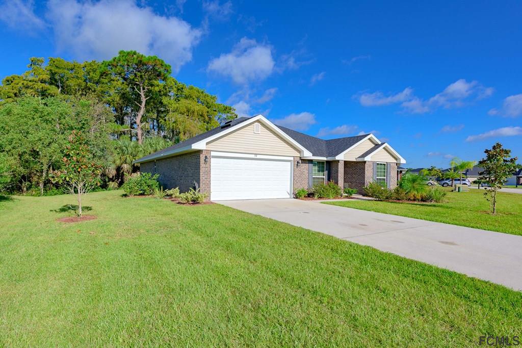 20 Turtle Ridge Drive Flagler Beach, FL 32136 - Photo 2 of 47 a view of outdoor space yard and garage