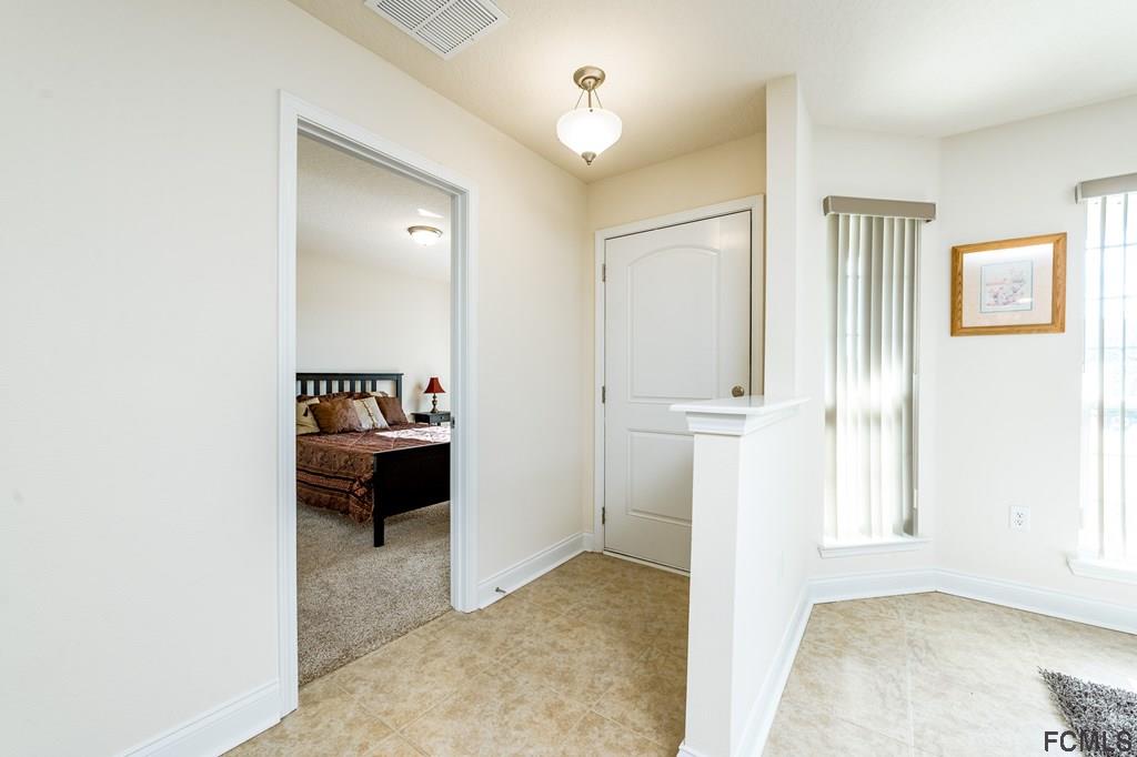 20 Turtle Ridge Drive Flagler Beach, FL 32136 - Photo 11 of 47 a view of livingroom with furniture and cabinet