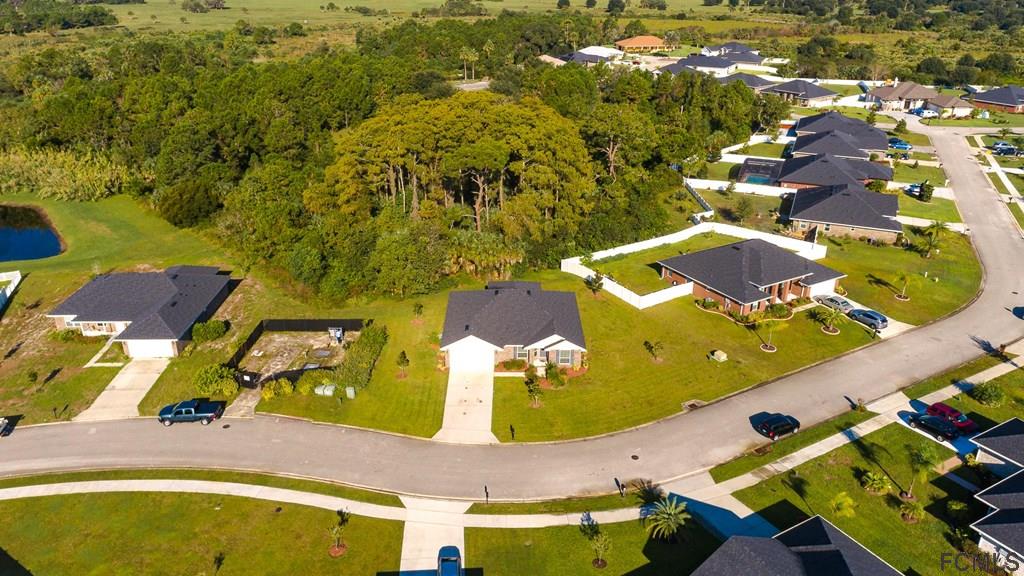 20 Turtle Ridge Drive Flagler Beach, FL 32136 - Photo 32 of 47 an aerial view of residential houses with outdoor space