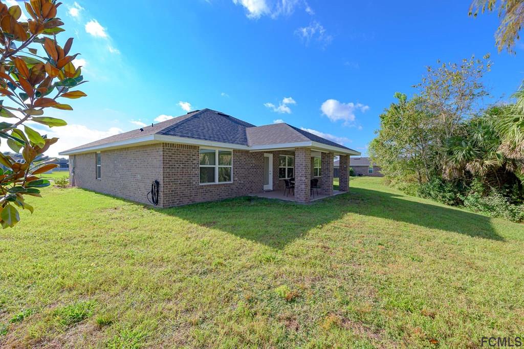 20 Turtle Ridge Drive Flagler Beach, FL 32136 - Photo 6 of 47 a view of a house with a backyard