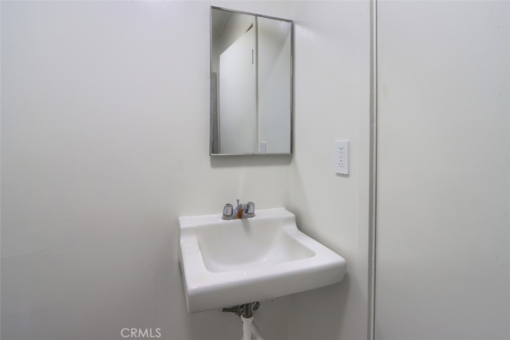 4949 Indian Peak Road Mariposa, CA 95338 - Photo 30 of 56 a bathroom with a sink and a mirror