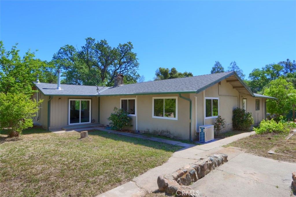 4949 Indian Peak Road Mariposa, CA 95338 - Photo 38 of 56 front view of a house with a yard